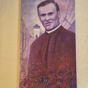 Ein Porträt von Pater Richard Henkes hängt im Foyer.